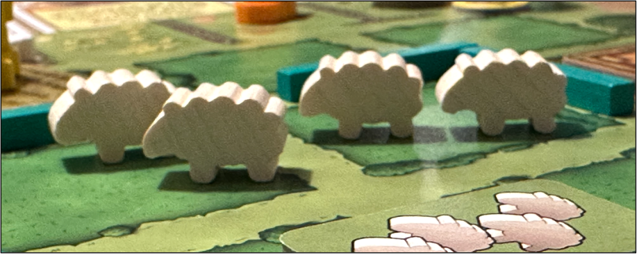 Sheep standees in a board game